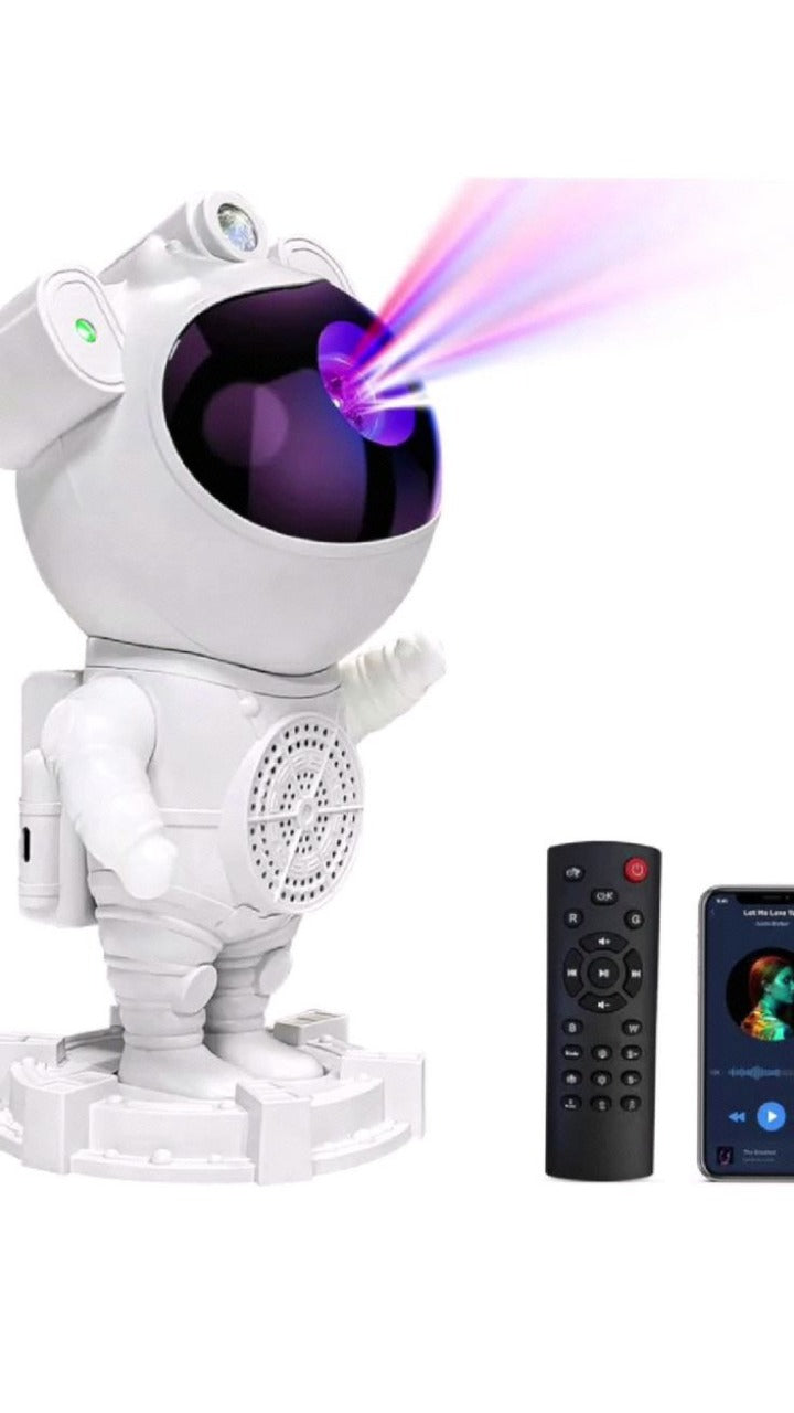 Spinning top with astronaut design, remote control, and smartphone displaying app interface on a white background