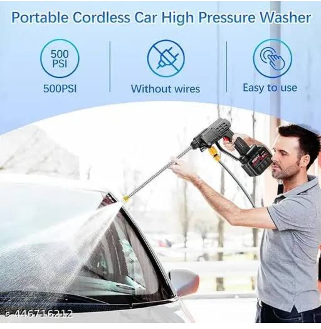 Person using a portable cordless car high pressure washer on a car