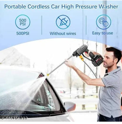 Person using a portable cordless car high pressure washer on a car