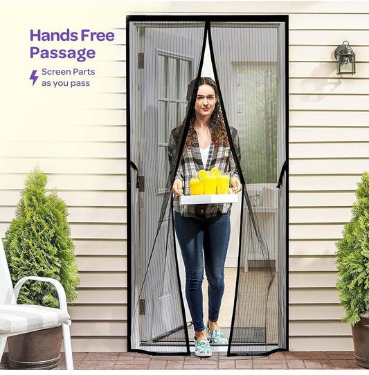 Woman using a hands-free magnetic screen door on a house exterior.