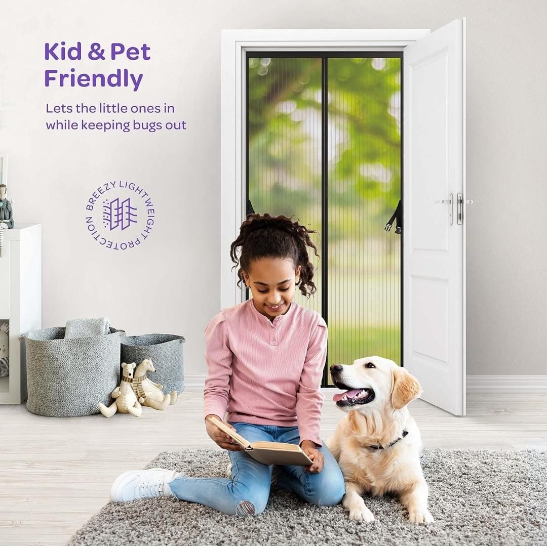 Child reading to a dog in a room with a Breezway screen door.