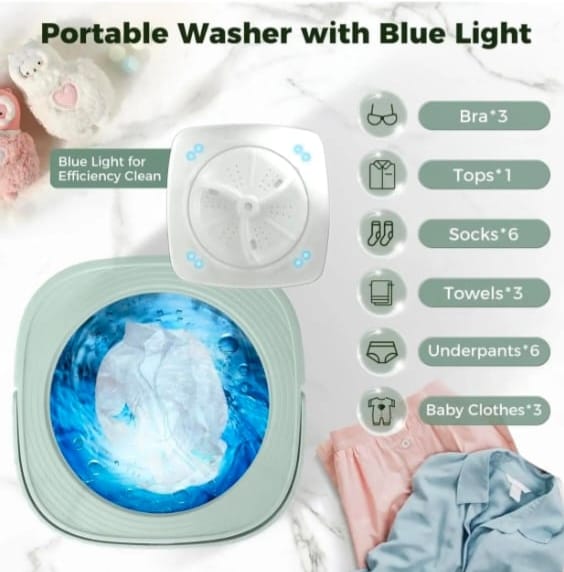 Portable washer with blue light and laundry items on a white background